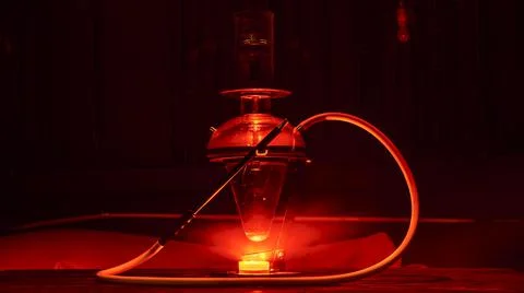 Magic hookah smoke with red lights. Design glass hookah with metal frame. Ill Stock Photos