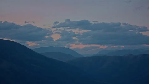 Magic hour clouds and hills aerial Stock Footage 155447867