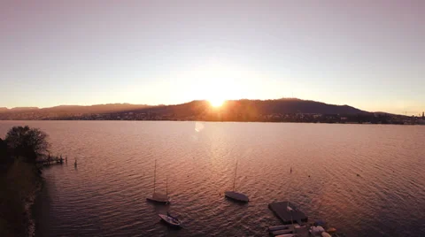 Magic hour light. lake at sunset. flying. trees Stock Footage 35256398
