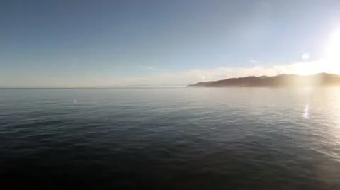 Magic Hour Ocean Ferry and Sunlight Hills Stock Footage 12211839