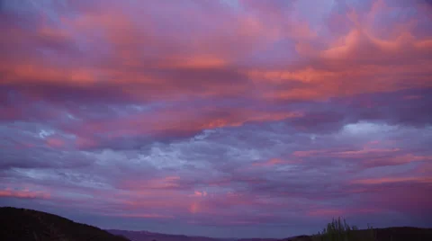 Magic Hour Sky arrives with small rainbow HD Stock Footage 39656511