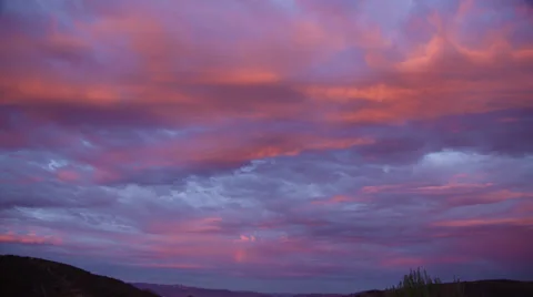 Magic Hour Sky arrives with small rainbow 4K Video stock 39656774