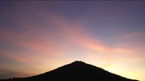 Magic hour time in sunset sky and silhouette mountain Stock Footage 239607262