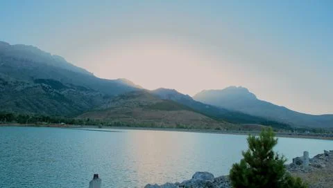 The Magic of Lakeside Sunsets Stock Photos