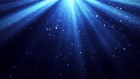 Magic light with flying particles of dust on blue background - 4K video Stock Footage 168123856