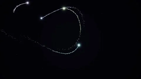 Magic Light Streaks and Sparkling Particle Animation Stock Footage 332708432
