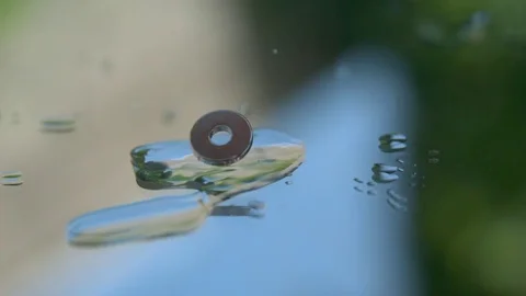 Magic Magnets Slow Motion 02 Stock Footage 71717563
