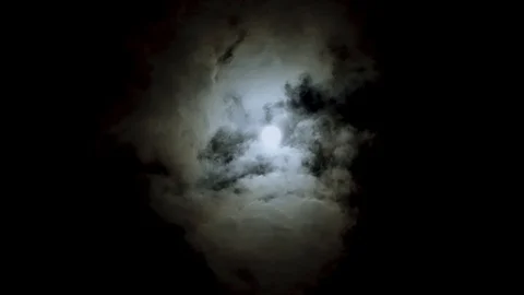 Magic moon on night blue sky on cloudy day. Clouds run slow across the sky. Stock Footage 108017137