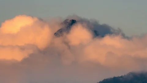 Magic mountains peak hidden in clouds Time lapse Stock Footage 94736919
