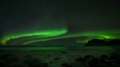 Magic Northern lights dancing over the Lofoten islands. Stock Footage 113329270