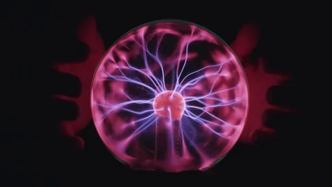 Magic Plasma Ball. Hand held close to the energy discharges Stock Footage 118263774