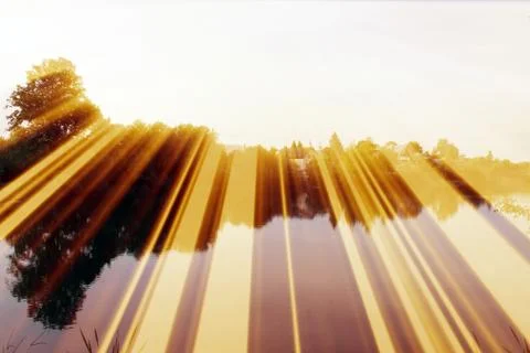Magic pond. Composition of a pond and rays Foto stock