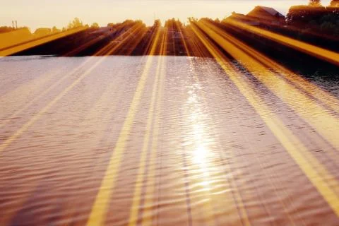 Magic pond. Composition of a pond and rays Foto stock