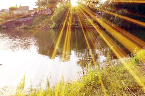 Magic pond. Composition of a pond and rays Foto stock