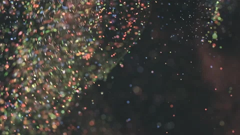 The magic powder floating on the dark background. slow motion Stock Footage 160063844