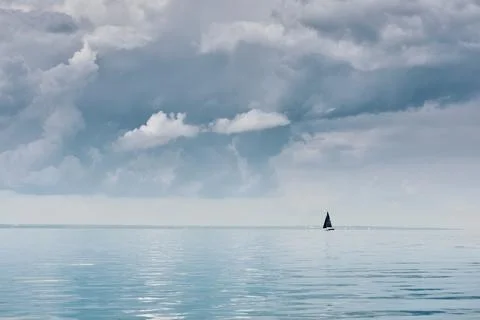 Magic reflections on water surface, sailing regatta in the Gulf of Finland at Stock Photos