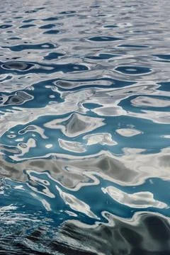 Magic reflections on water surface, sailing regatta in the Gulf of Finland at Stock Photos