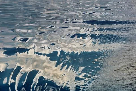 Magic reflections on water surface, sailing regatta in the Gulf of Finland at Stock Photos