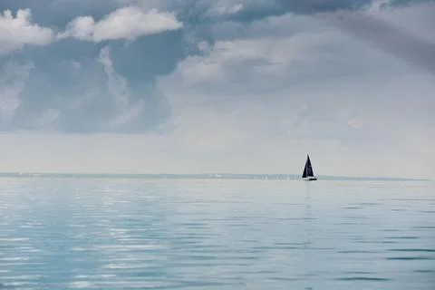 Magic reflections on water surface, sailing regatta in the Gulf of Finland at Stock Photos
