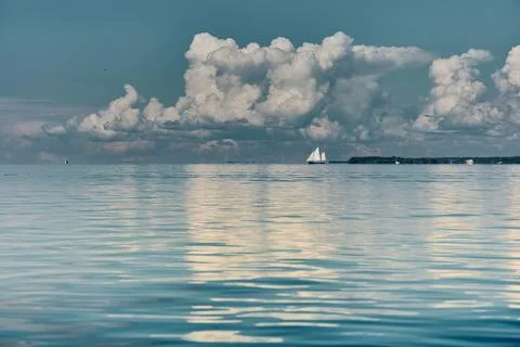 Magic reflections on water surface, sailing regatta in the Gulf of Finland at Stock Photos