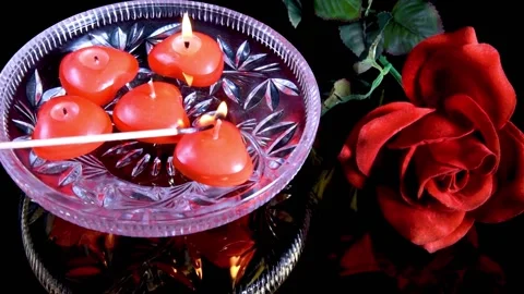 Magic  ritual with red floating burning candles on black background. Stock Footage 153471256