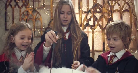 Magic school lesson, older student is teaching how to brew a potion, 4k Stock Footage 149036564