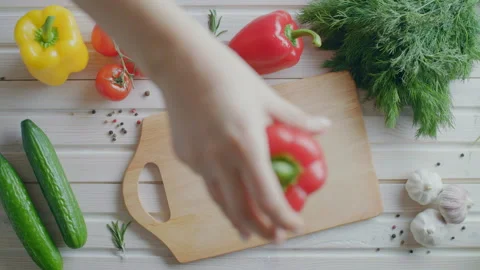Magic slicing a red pepper, flat lay of healthy food Stock Footage 86042242