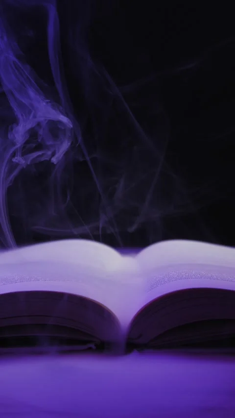Magic Spell Book Emitting Mystical Purple Smoke In The Dark Stock Footage 329810586