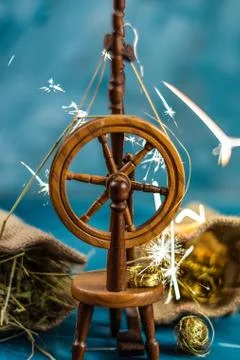 Magic spinning wheel spin straw to gold Stock Photos