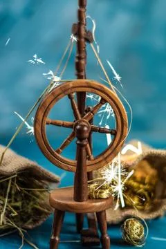Magic spinning wheel spin straw to gold Stock Photos