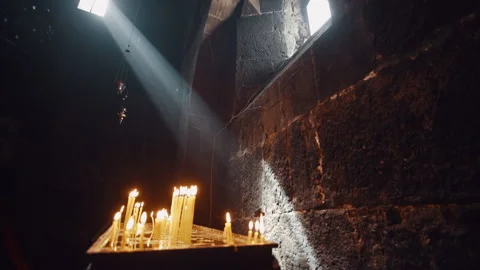 Magic sunrays beaming through the old window in Hovhannavank monastery Stock Footage 237716683