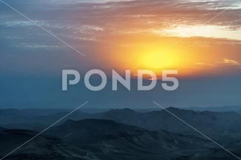 Magic sunrays in judean holy land desert in Israel. Stock Photos