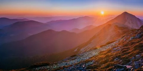 Magic sunset in the mountains Stock Photos