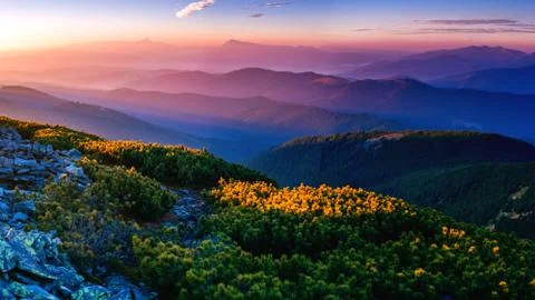 Magic sunset in the mountains Stock Photos