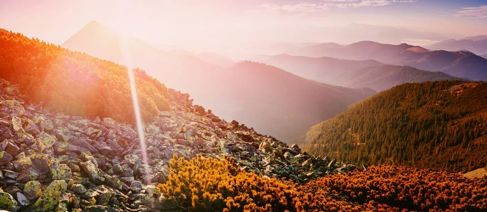 Magic sunset in the mountains Stock Photos