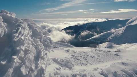 Magic view beautiful winter mountains over frozen snowdrift in cold sunny nature Stock Footage 179408080