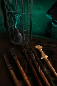 Magic wands laid out on the table of sorcerer Stock Photos