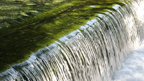 Magic waterfall at sunny day Видео 231909324