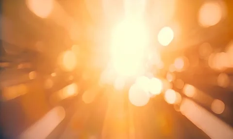 Magical abstract sunrays background bokeh lights. Gold dust floats in the air Stock Footage 255834764