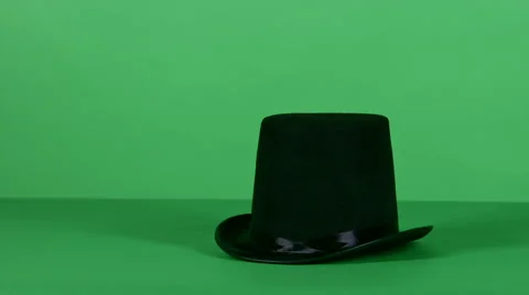 Magical black top hat rotates on green screen HD Video stock 46510073