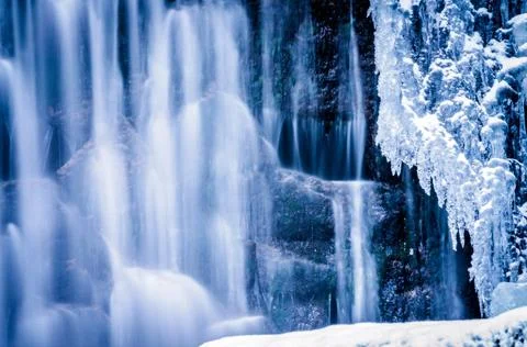 Magical blue waterfall Wild Waterfall, known as Dziki Wodospad, in beautif... Stock Photos