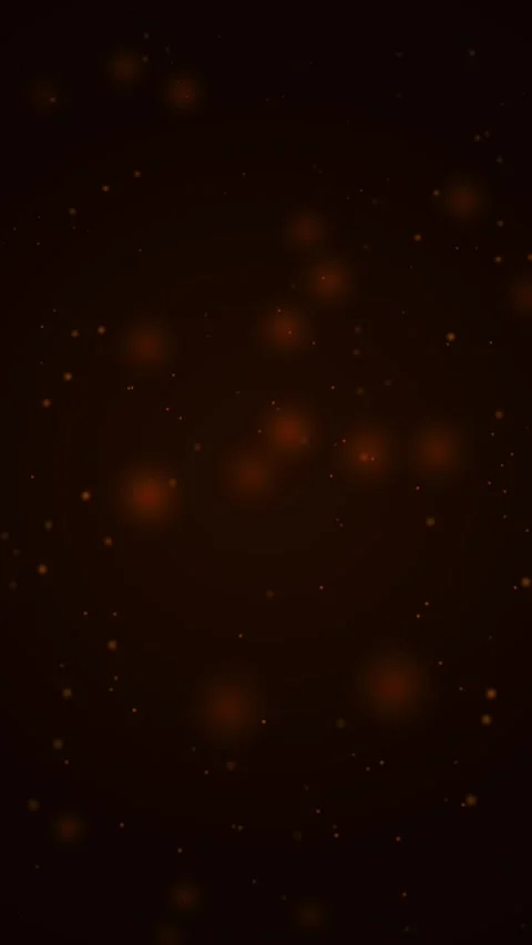 Magical bokeh particles floating on a deep burnt orange abstract background Stock Footage 345491485