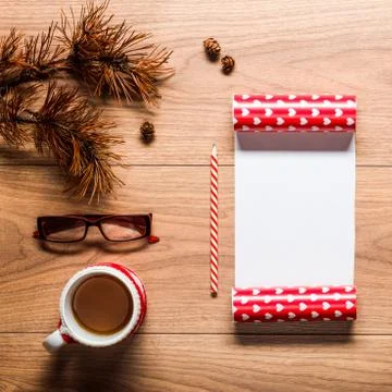 Magical christmas theme background, pine cones, coffee, cookies and an Stock Photos