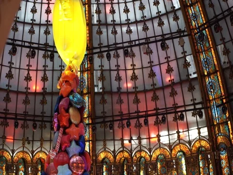 Magical Christmas Tree inside Galeries Lafayette in Paris France Stock footag Stock Footage 84896471