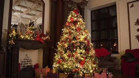 Magical Christmas tree stands in the middle of the room Stock Footage 167740880