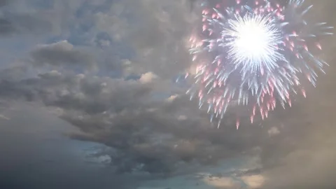 Magical cloudscape sky with multiple colourful fireworks animation background. Vídeo Stock 337569408
