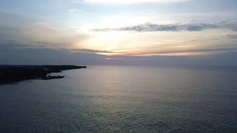 Magical Evening Light Reflecting on Calm Sea Water Video stock 326739991