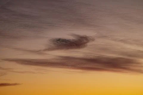Magical evening sky with clouds and play of colours Stock Photos