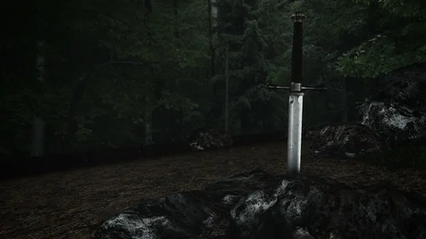 The Magical Excalibur Sword Inside a Rock in a Forest Stock Footage 112737970