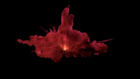 A magical explosion with colored smoke, with trails and fire in the center. Stock Footage 121330317
